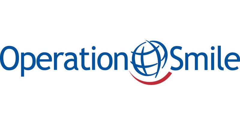 Operation Smile partner logo — trusted partner of Tour By Emirati